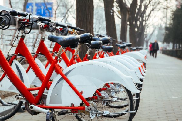 Public Bike Rental Station In Beijing, China With Bicycles Arranging In Row Ready For Public Rental
